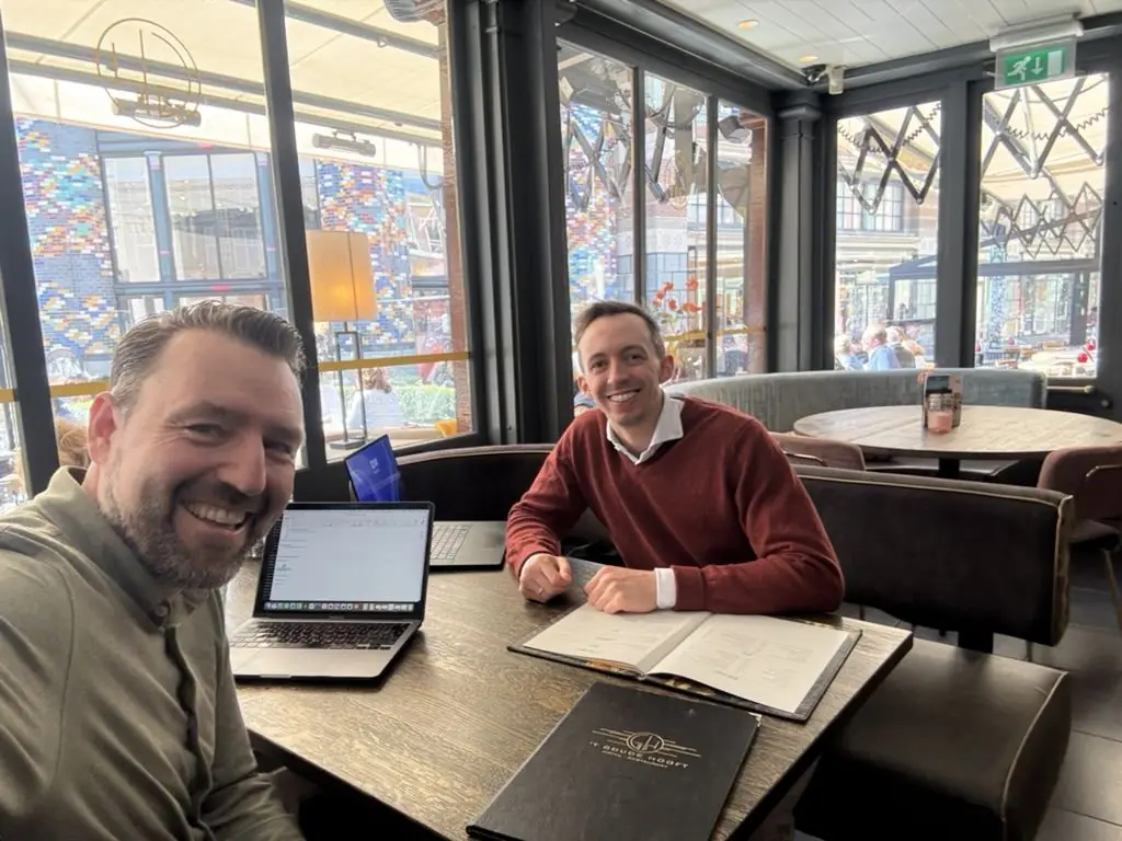 The two founders working together